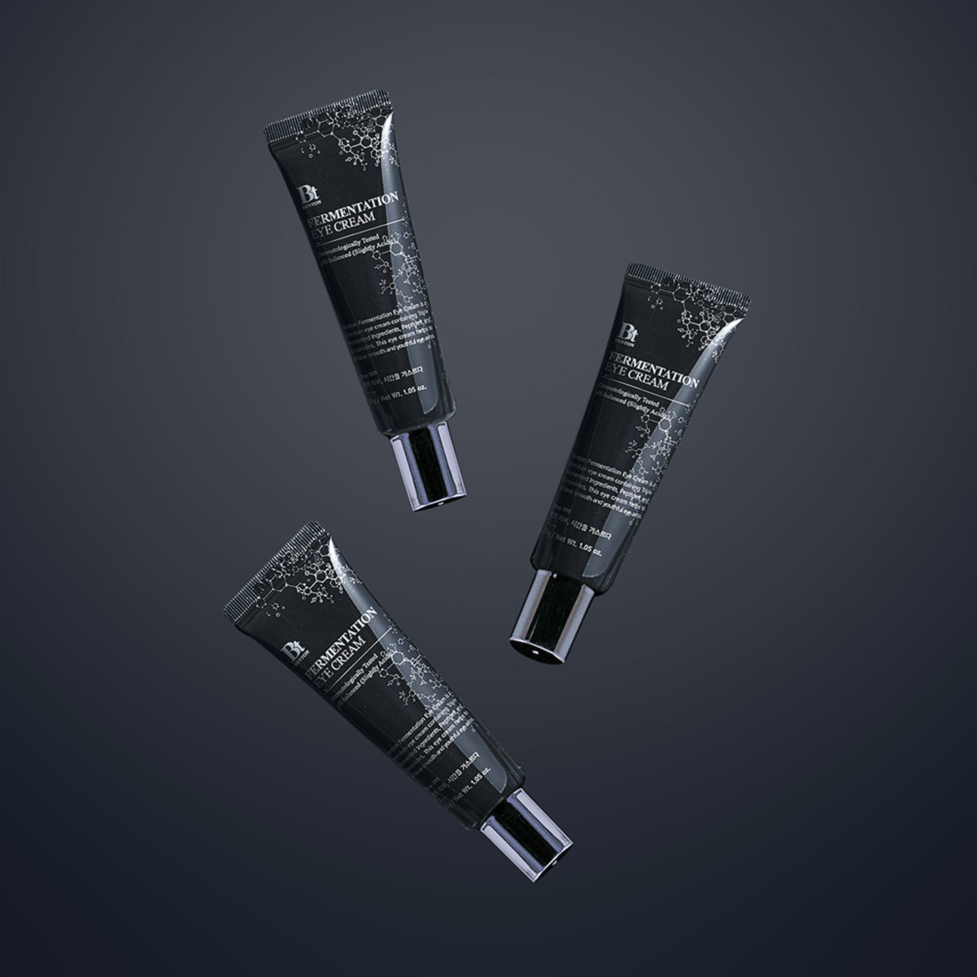 Three black cosmetic tubes labeled 'Pimentation' on a dark gray background
