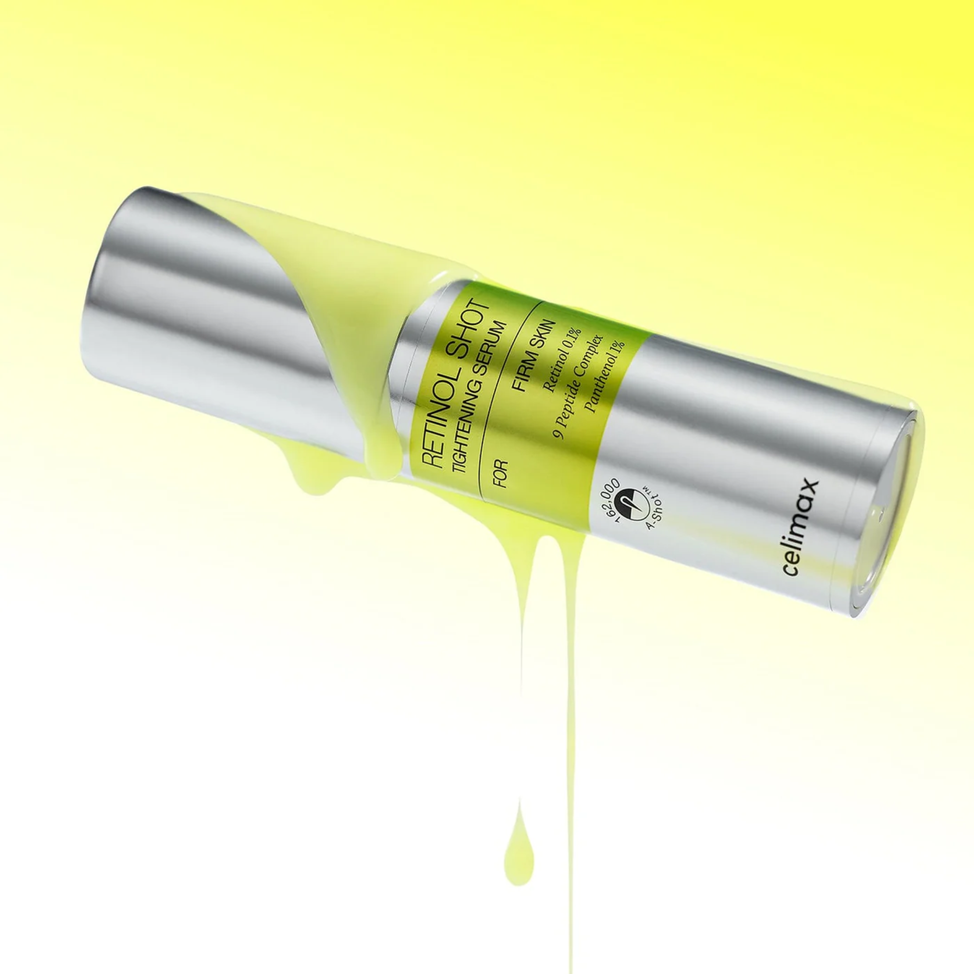 Skincare serum bottle with yellow liquid on a gradient background