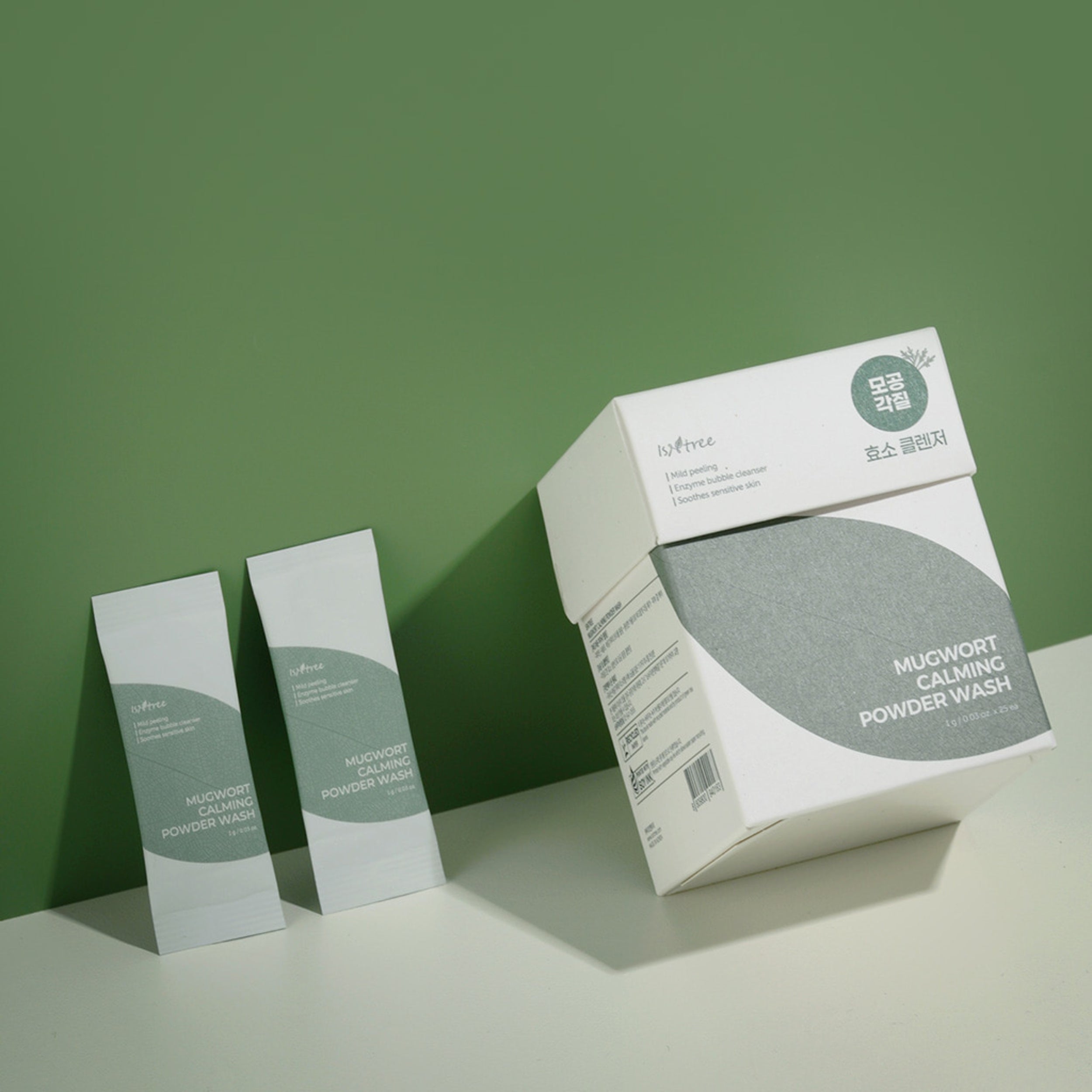 Mucwort Calming Powder Wash packaging on a green background