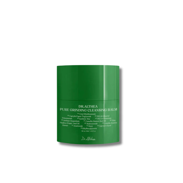 Green jar of Dralthea Pure Grinding Cleansing Balm on a white background