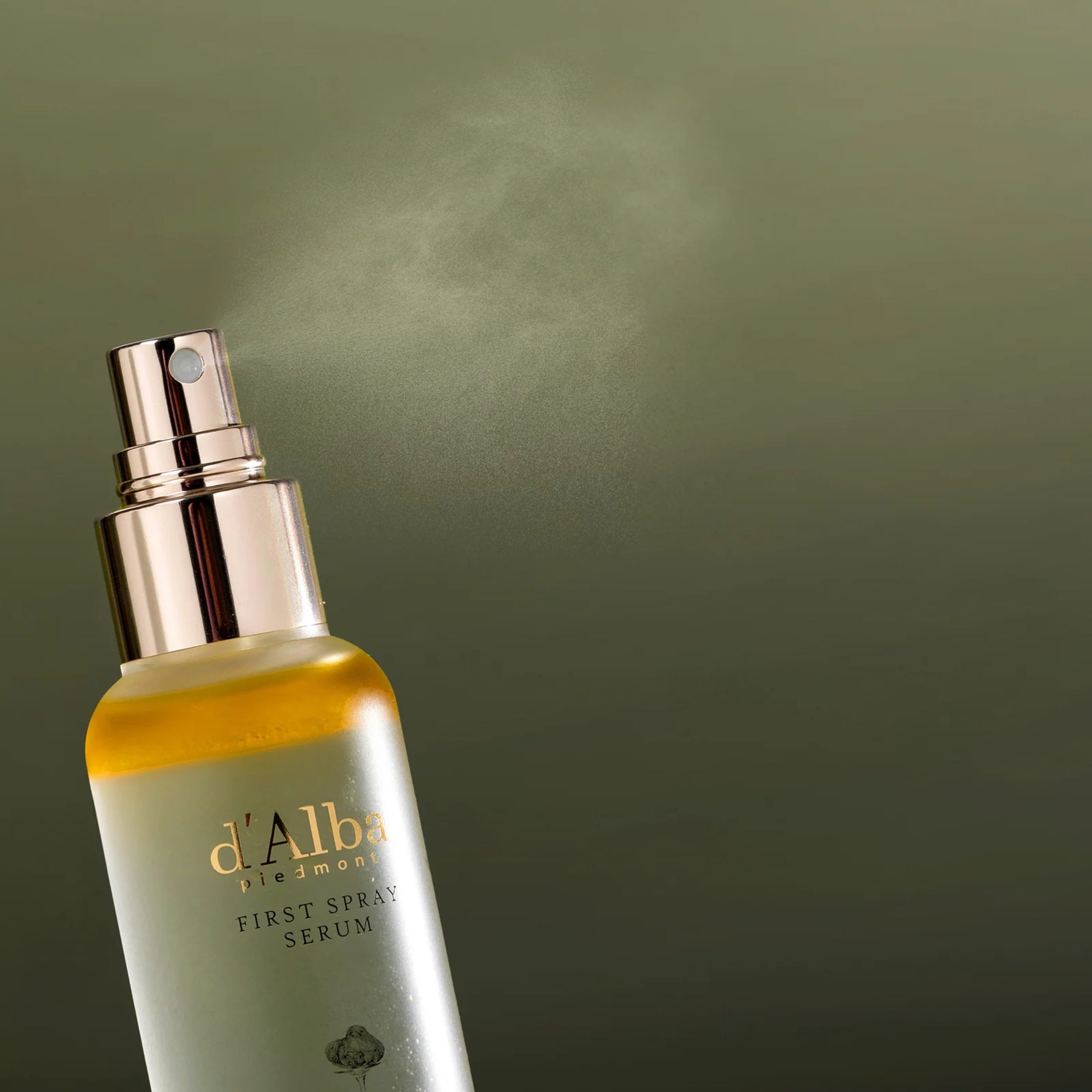 d'Alba skincare serum bottle with mist on a green background