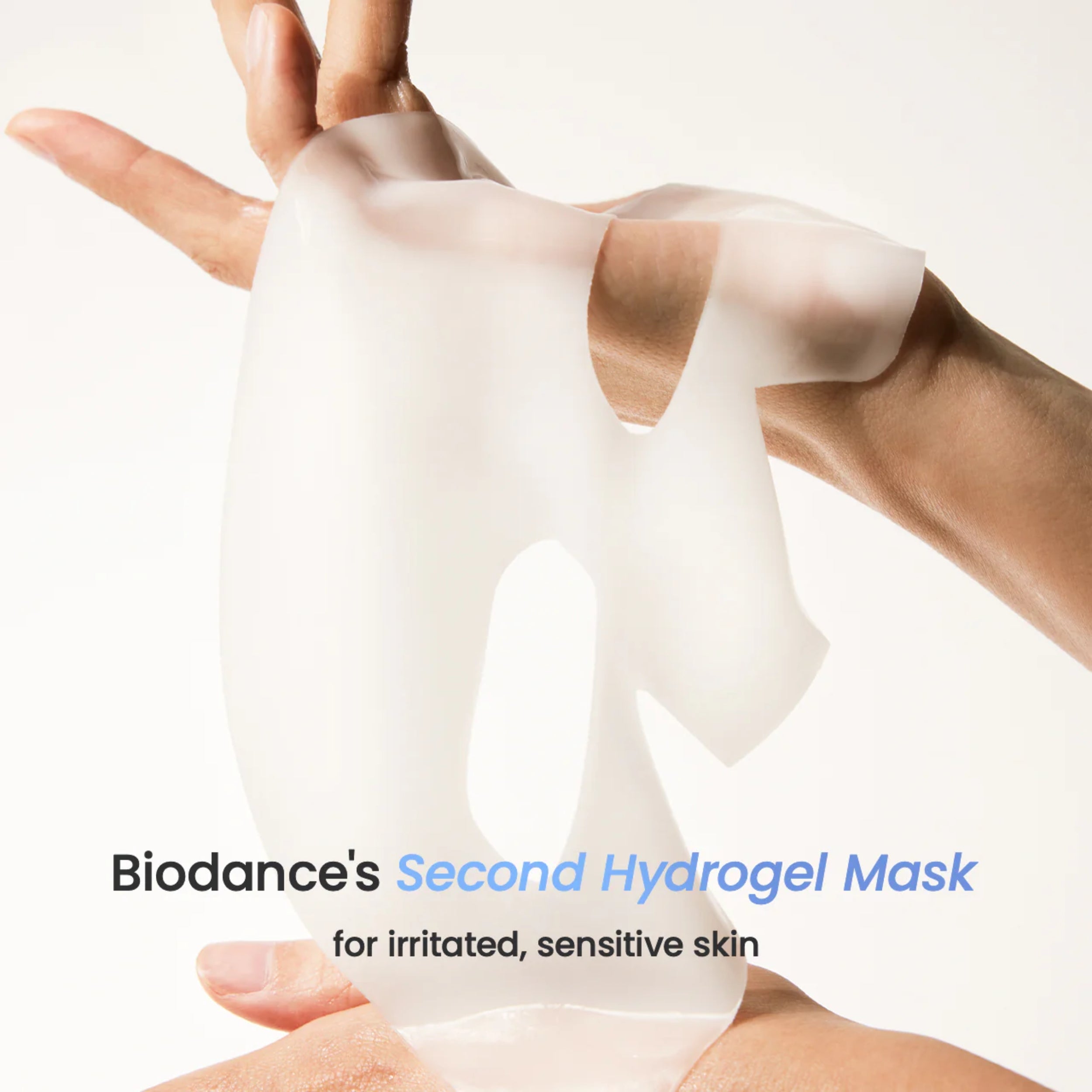 Biodance's Second Hydrogel Mask held between two hands with a white background