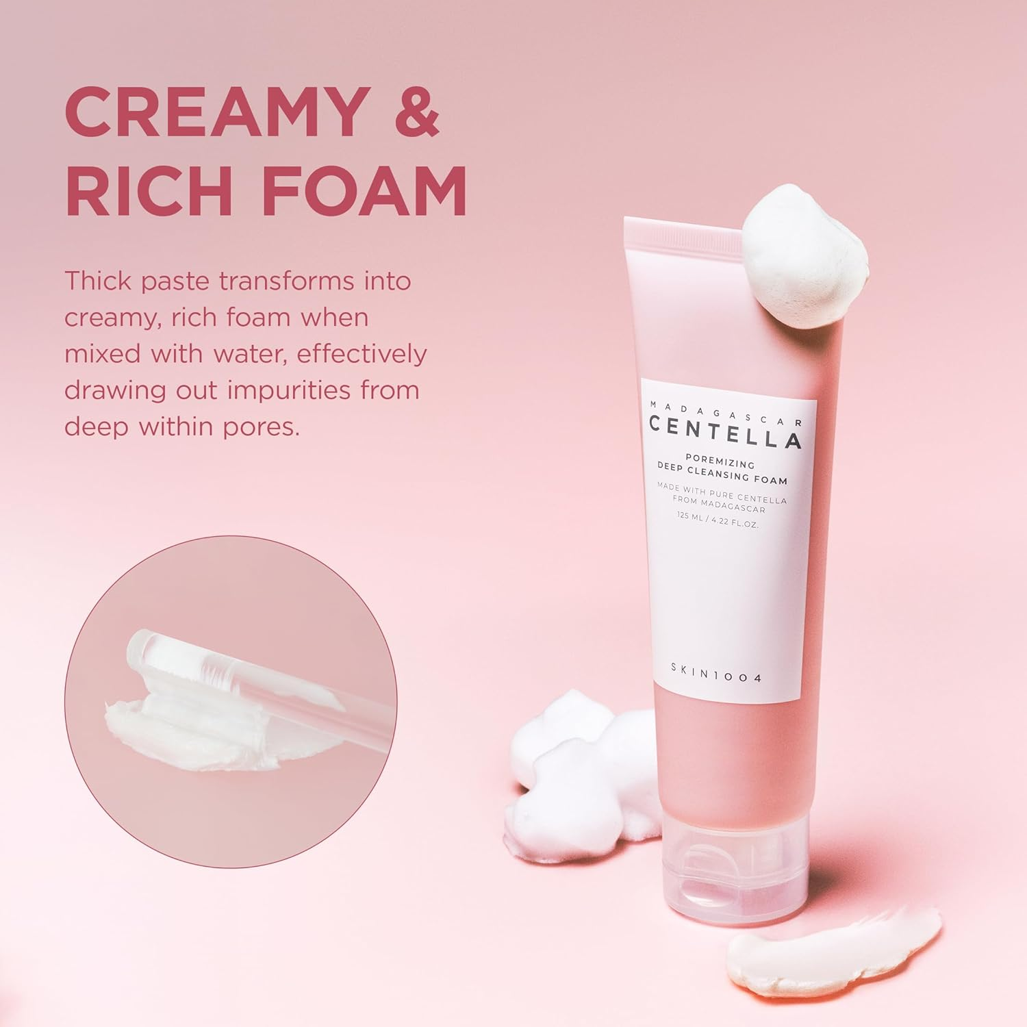 Skincare product with creamy foam on a pink background
