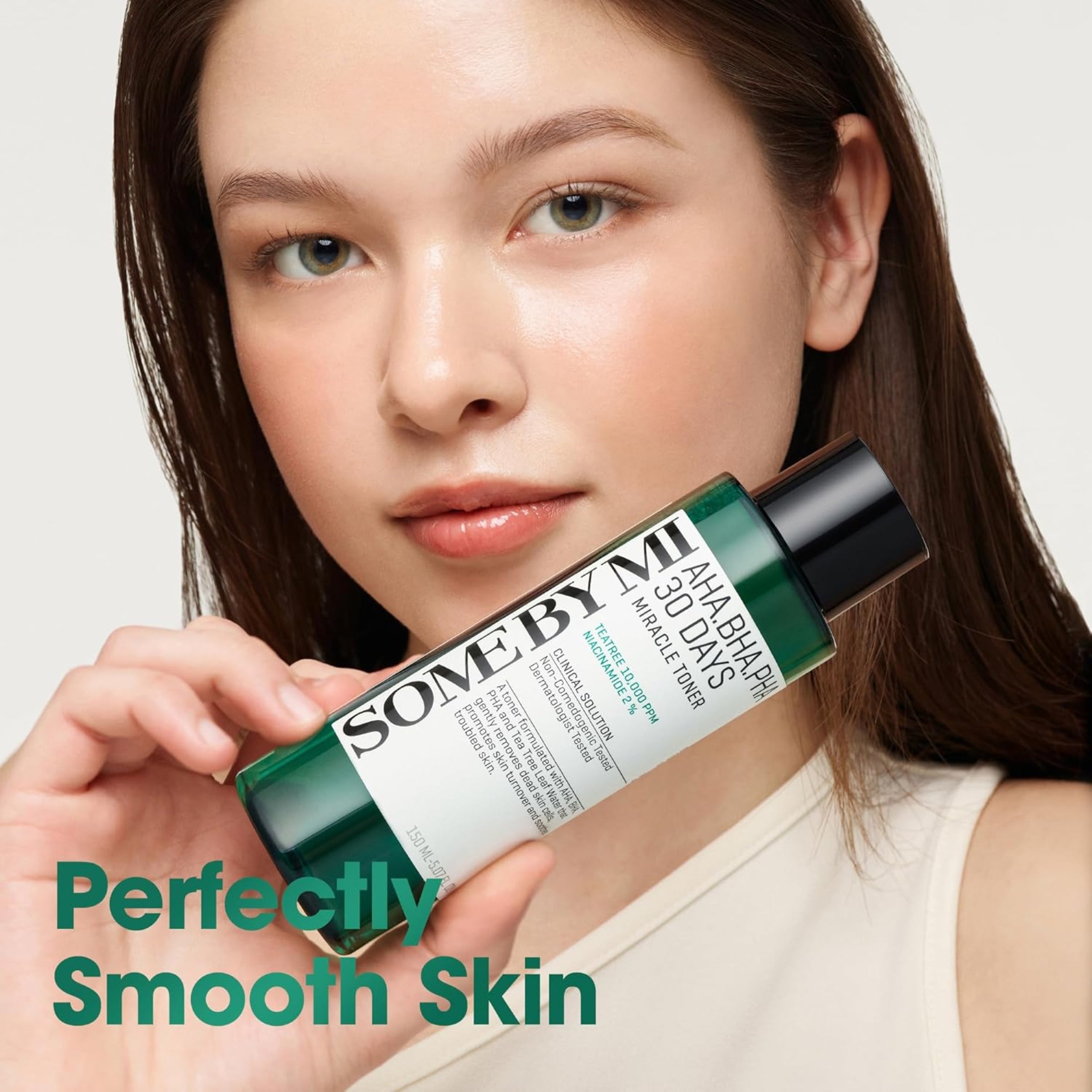 Woman holding a 'Some By Mi' skincare product with text 'Perfectly Smooth Skin'.