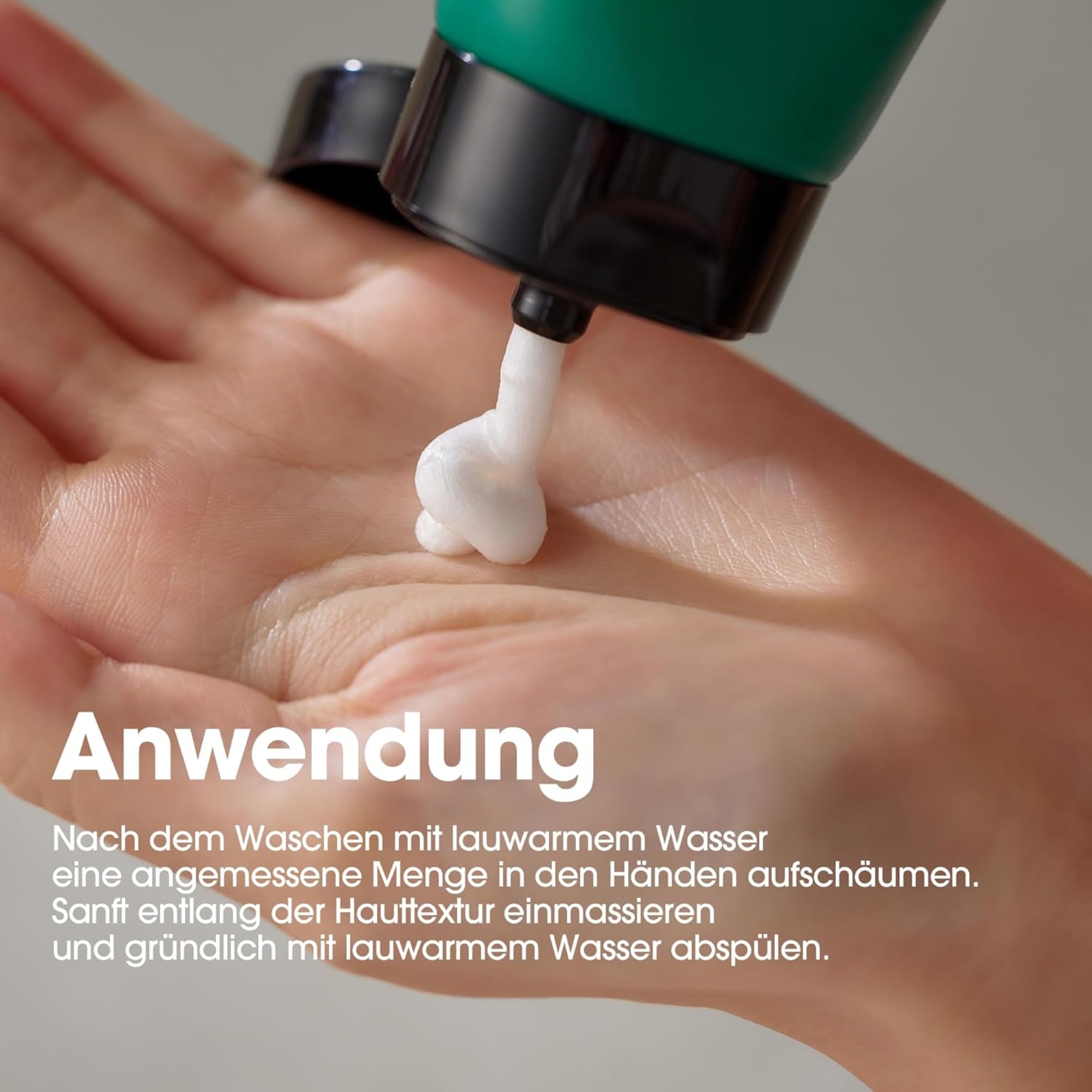 Hand soap being dispensed onto a hand with text below.