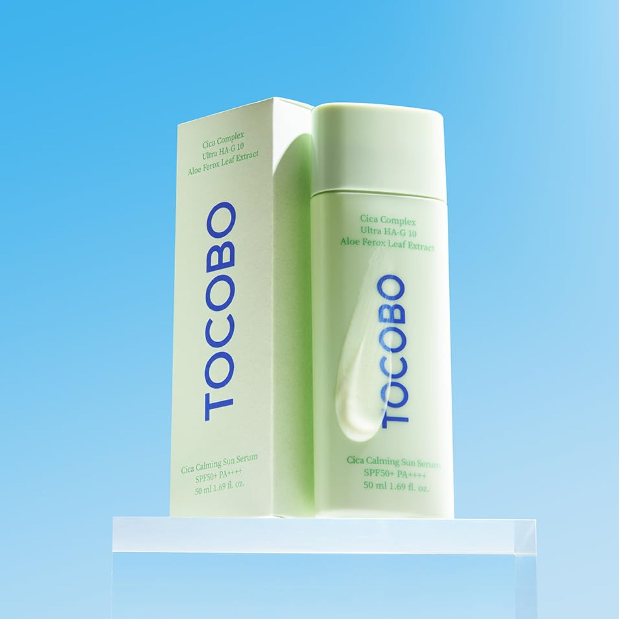 Tocobo skincare bottle and box on a blue background
