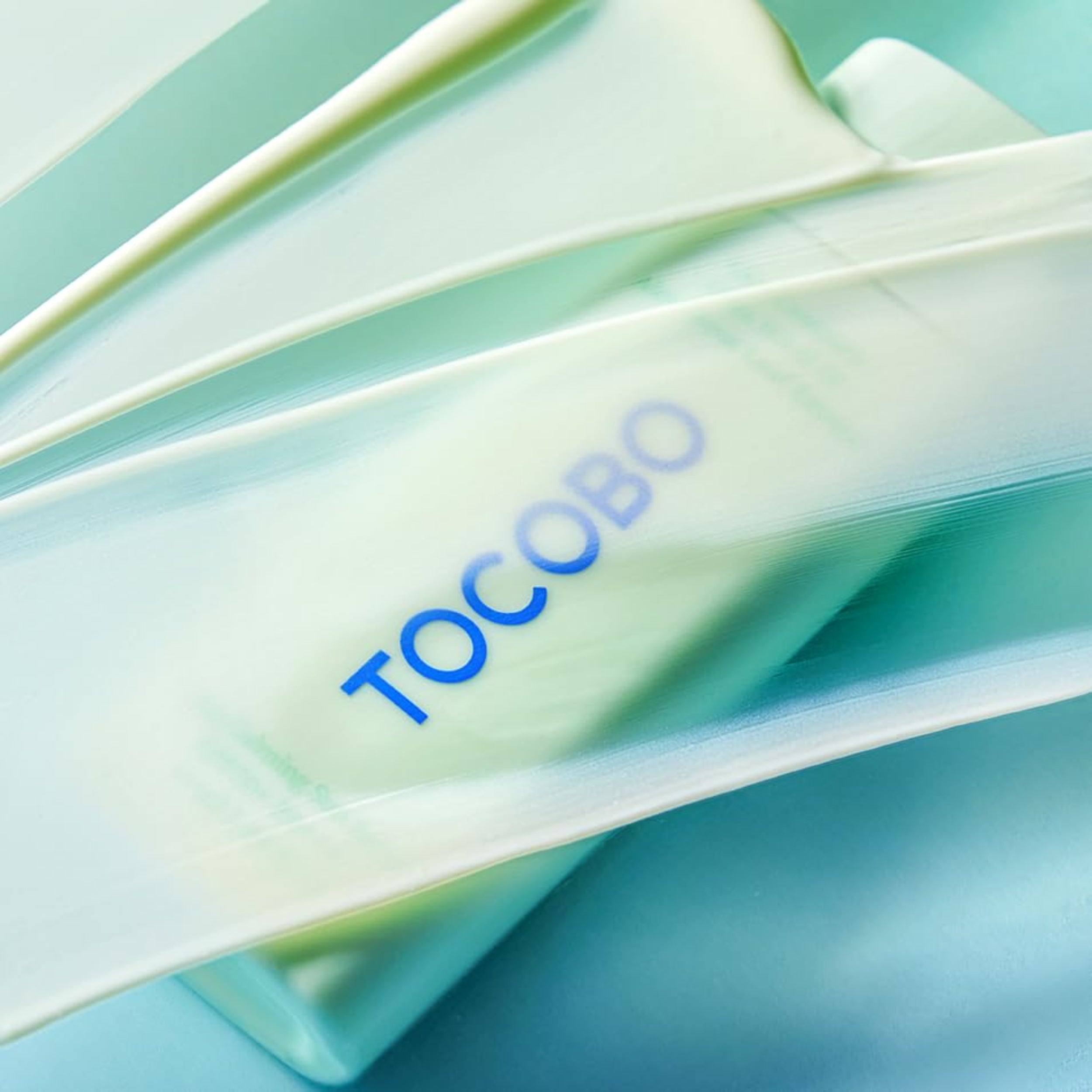 Tocomo product packaging on a light blue background