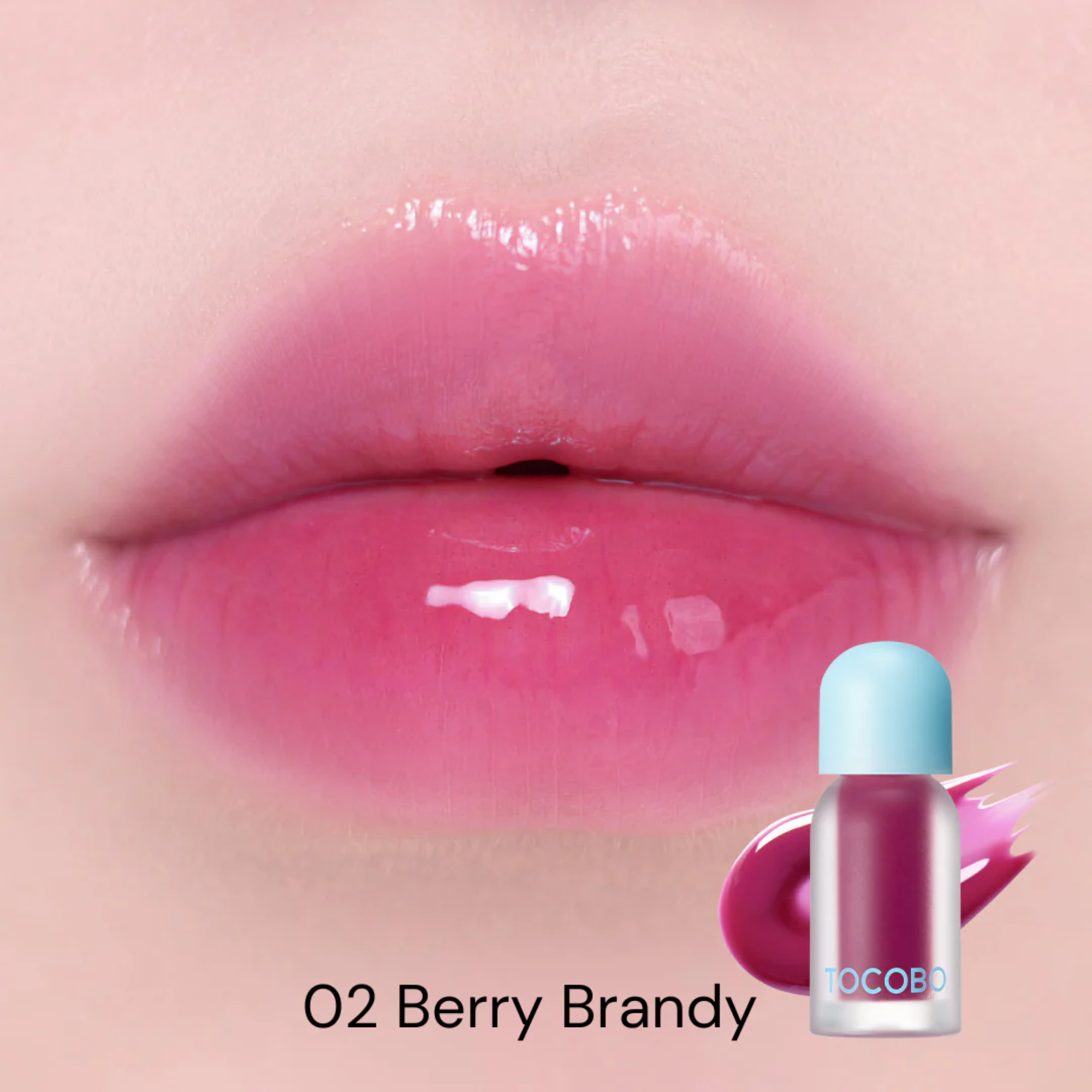 Lip gloss on lips with a bottle labeled '02 Berry Brandy' and brand name.