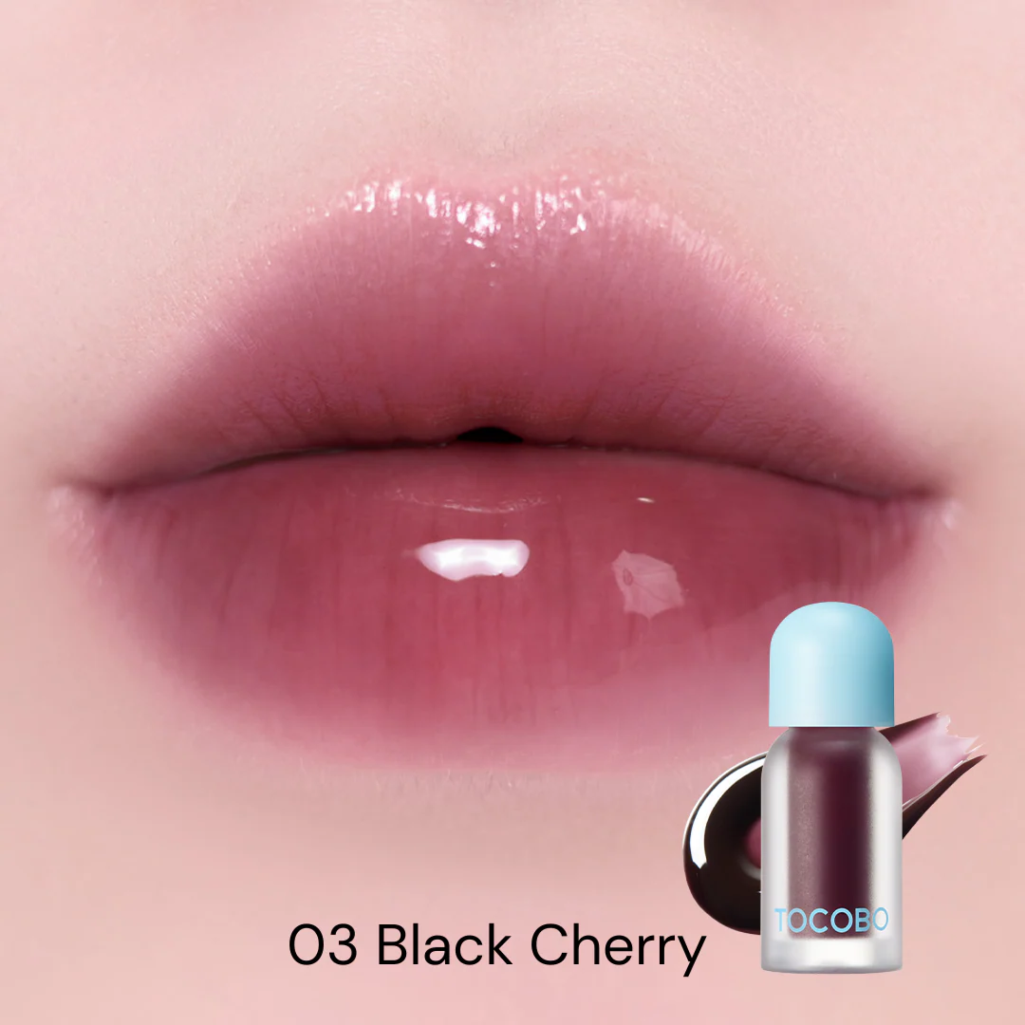 Lip gloss labeled '03 Black Cherry' applied on lips with a bottle of gloss in the corner.
