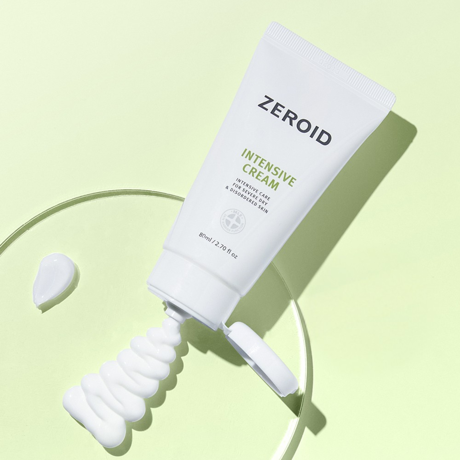 Tube of ZEROID Intensive Cream with applicator on a light green background