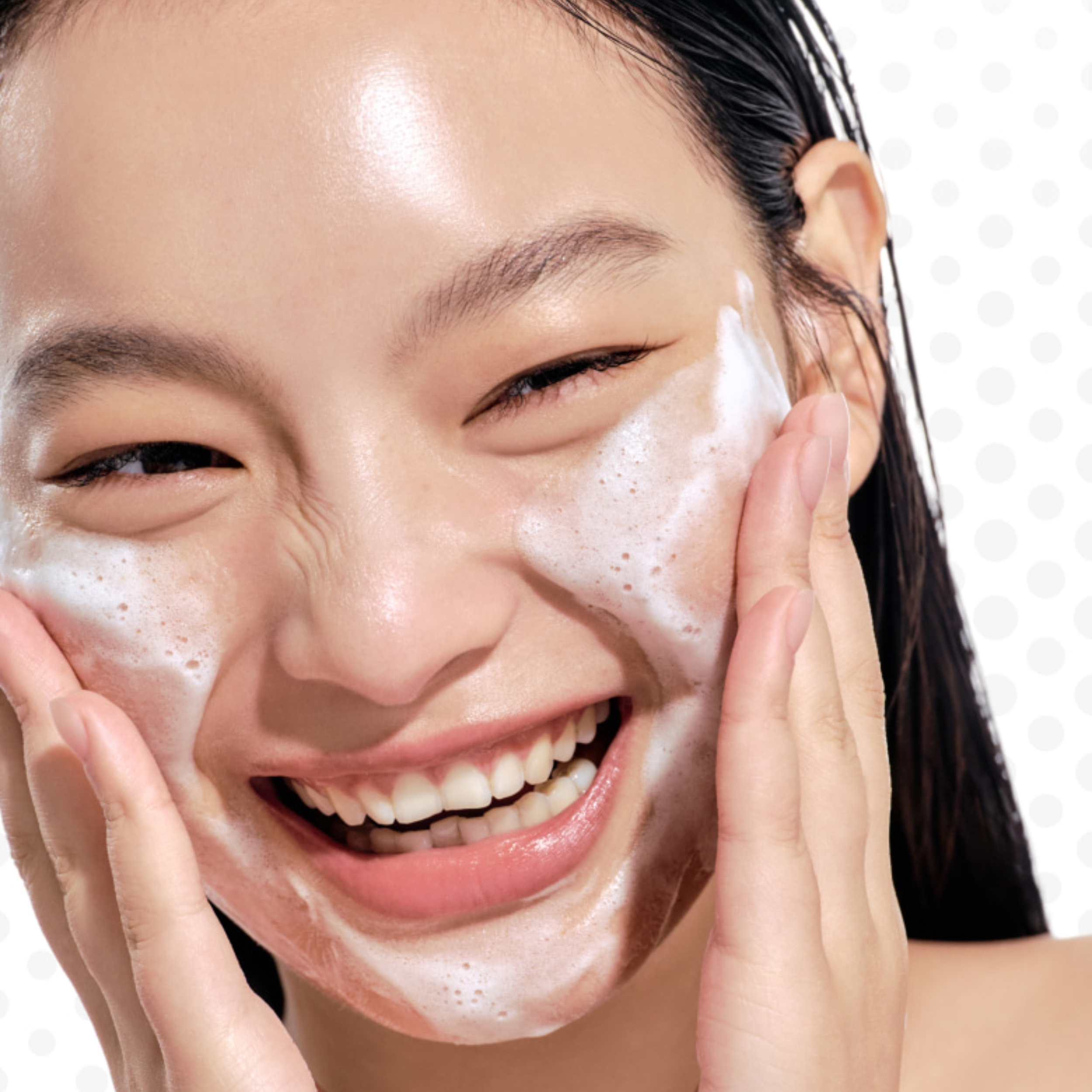 Woman applying a facial mask with a white background