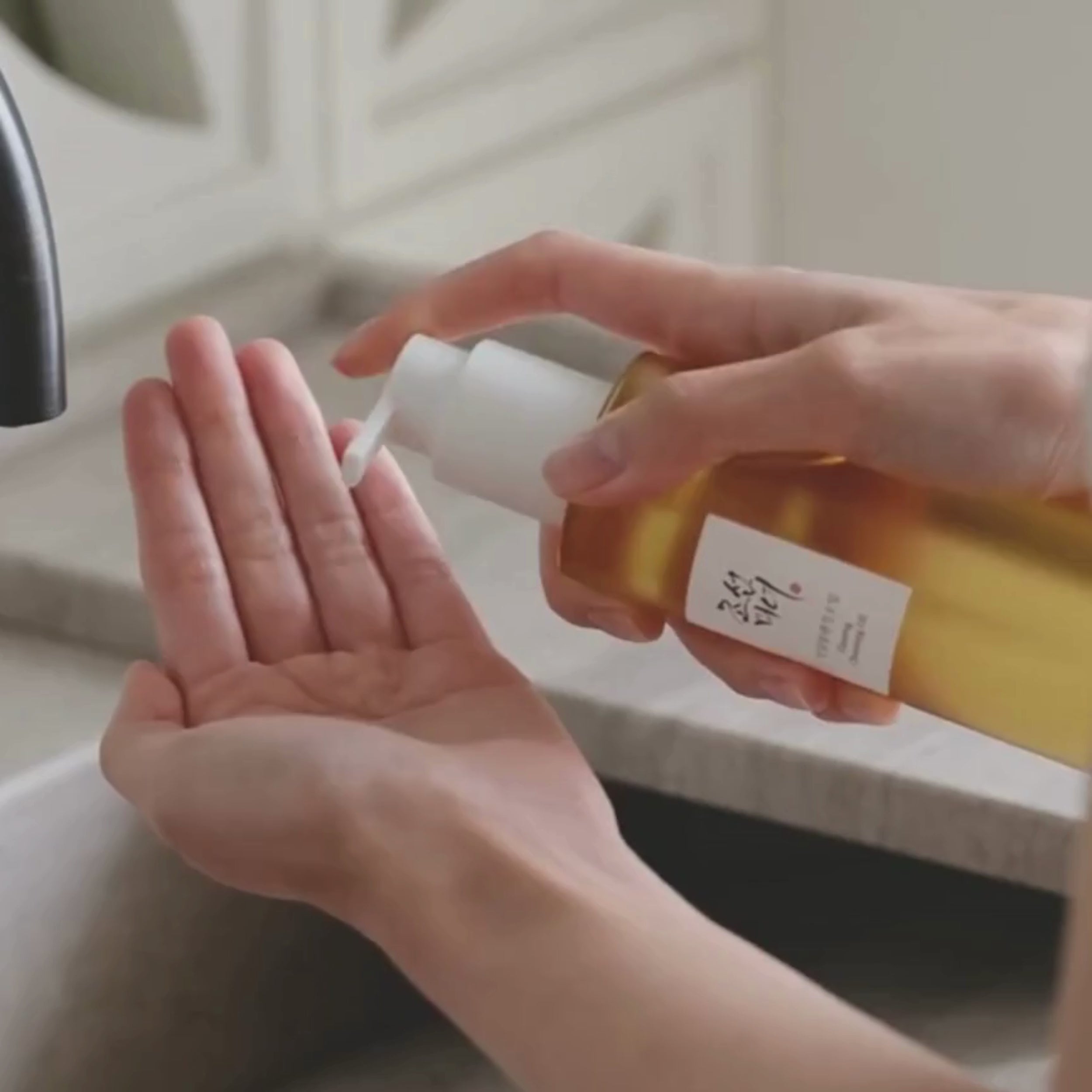 applying cleansing oil